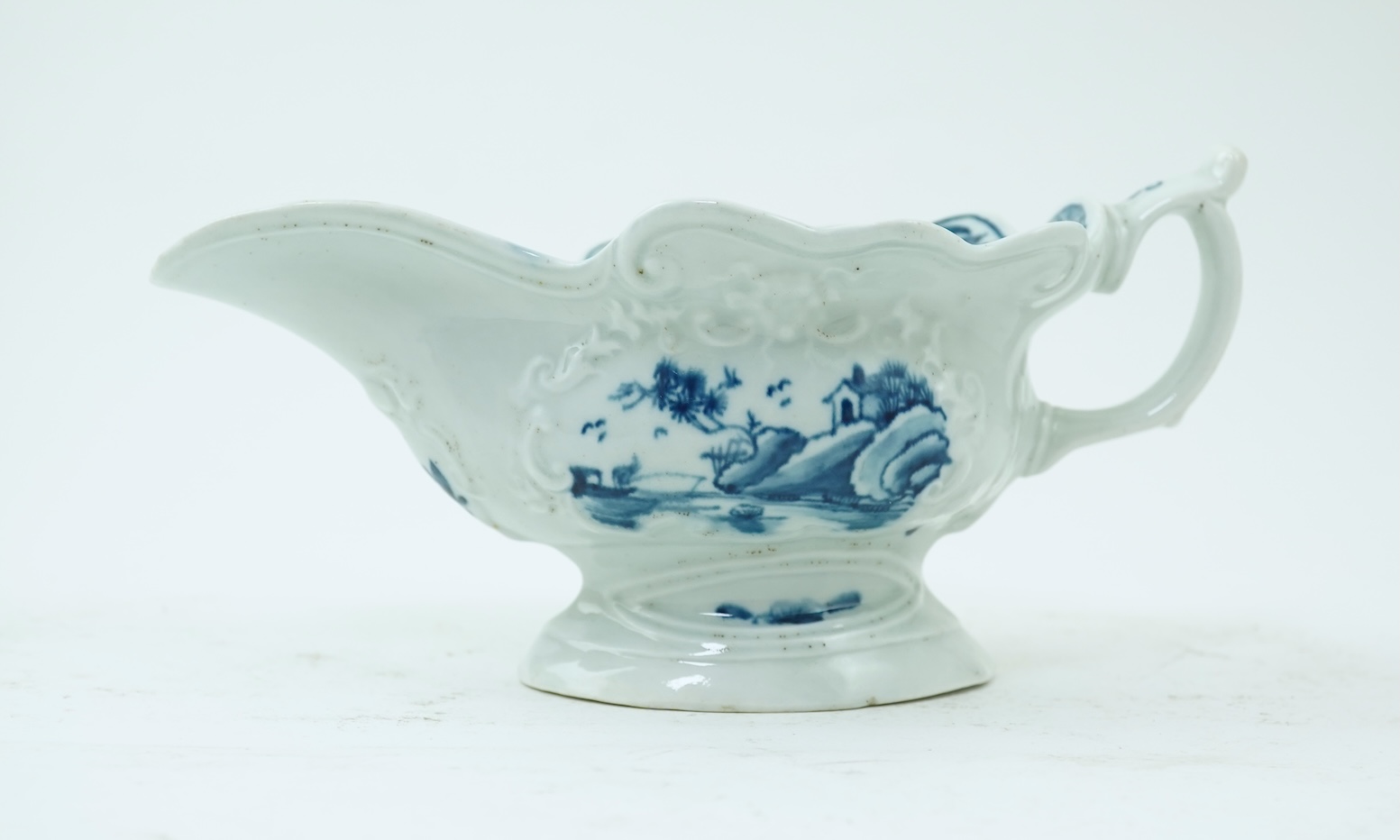 A Worcester blue and white Triangular Platform pattern high footed sauce boat c.1755